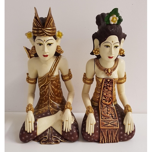 236 - PAIR OF 20th CENTURY CARVED INDONESIAN FIGURES
depicting a bride and groom in traditional dress, app... 