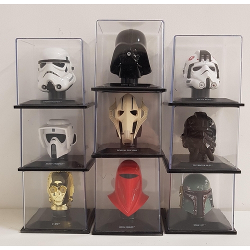 388 - NINE STAR WARS MINIATURE HELMETS
including Darth Vader, C-3PO, Storm Trooper, Scout Trooper, At-At P... 