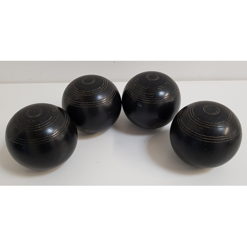 306 - SET OF FOUR LAWN BOWLS
by R.W.Hensell (4)