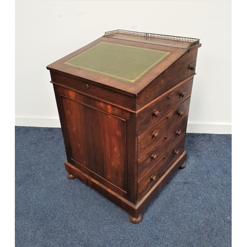 435 - 19th CENTURY ROSEWOOD DAVENPORT
in the style of Gillows with a brass galleried top above an inset le... 