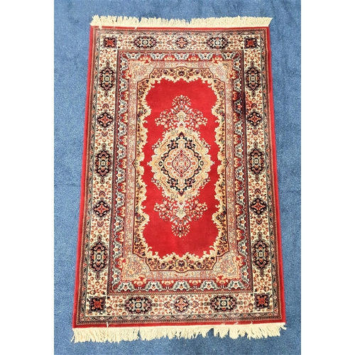 438 - MECHED RUG
the claret ground with a central medallion encased with a broad floral border, fringed, 2... 