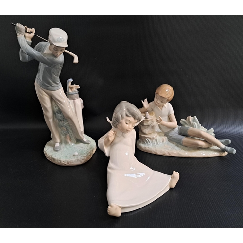 220 - THREE LARGE LLADRO FIGURINES
comprising Golfer, 4824, 28cm high, Pleasant Meeting, 4858, 15.5cm high... 