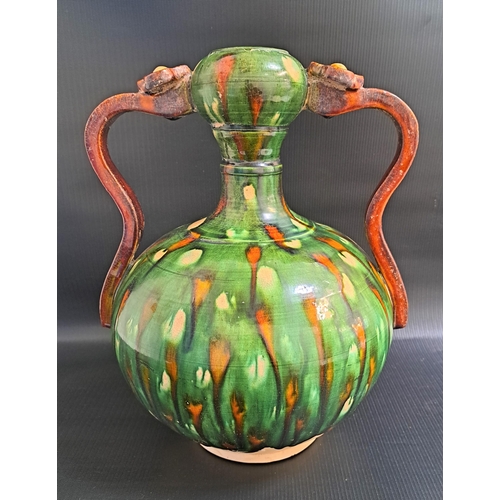 226 - CHINESE SANCAI POTTERY VASE
with ruyi type side handles, 33cm high