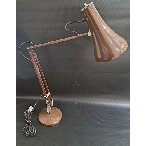 283 - HERBERT TERRY & SONS ANGLEPOISE LAMP
raised on a circular weighted base and finished in brown