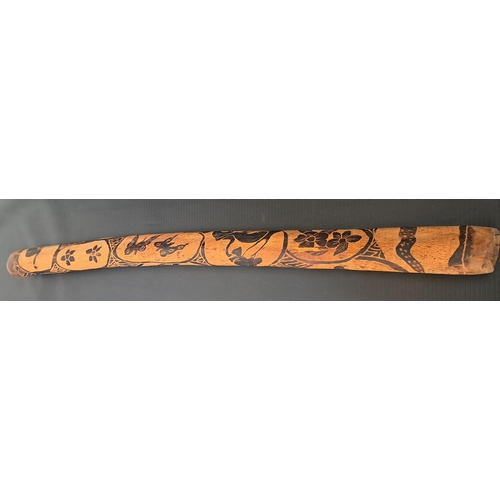 318 - AUSTRALIAN DIDGERIDOO
the carved wood body decorated with animals, 97cm long