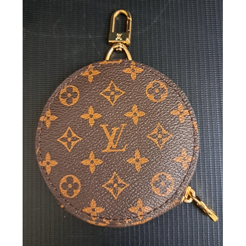 311 - LOUIS VUITTON MONOGRAM ROUND COIN PURSE
approximately 9.2cm diameter