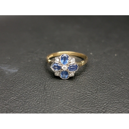 161 - PRETTY SAPPHIRE AND DIAMOND CLUSTER RING
the five diamonds interspersed with four oval cut sapphires... 