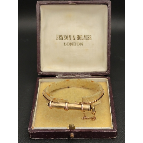 167 - UNMARKED GOLD SAMPSON MORDAN & CO. BANGLE WITH ATTACHED PROPELLING PENCIL
the pencil attached to the... 