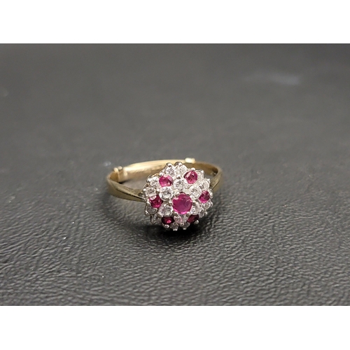 174 - RUBY AND CZ CLUSTER RING
on nine carat gold shank with nine carat gold size adjuster, size O-P (with... 