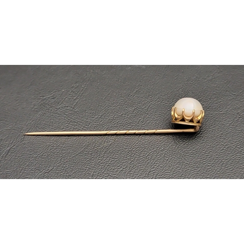 179 - PEARL SET STICK PIN
in unmarked high carat gold mount