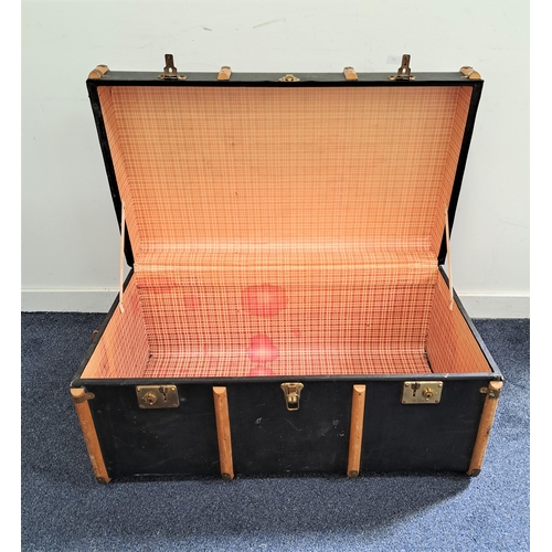 295 - VINTAGE TRAVEL TRUNK
with wood banding and side carrying handles, 91cm wide