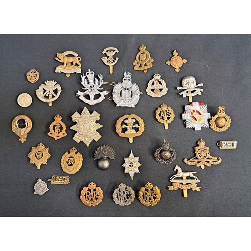 329 - SELECTION OF MILITARY REGIMENTAL BADGES
including The Glasgow Highlanders, Royal Marines, Royal Engi... 