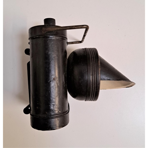 333 - AIR RAID WARDEN TORCH
marked A.R.P. 1939 to the lid, with a fold over handle and downlight lens cove... 