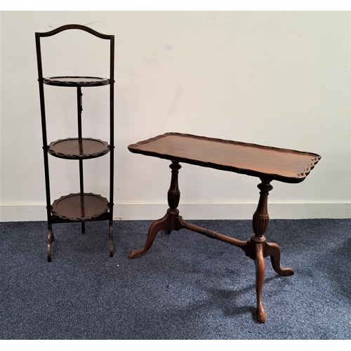 486 - MAHOGANY FOLDING CAKE STAND
with three tiers, 88.5cm high, together with a mahogany occasional table... 