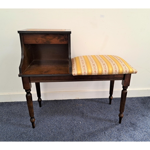 487 - MAHOGANY TELEPHONE SEAT
with an inset top above a drawer with a shelf below and a padded seat to the... 