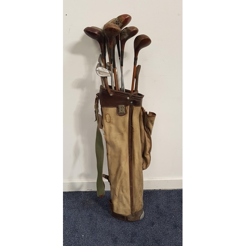 307 - SELECTION OF VINTAGE GOLF CLUBS
including a Spalding, three Nicoll, Supreme and three other woods, p... 