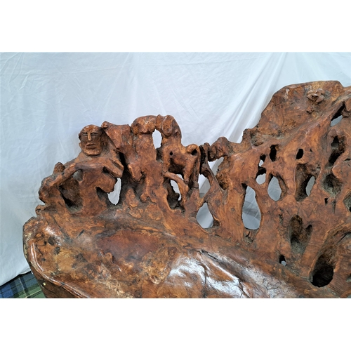 480 - CARVED OLIVE WOOD ROOT BENCH
of natural shaped form, the bench carved with masks, figures, animals, ... 