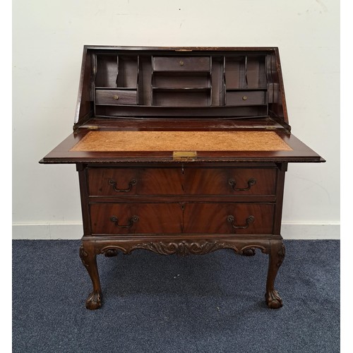 484 - MAHOGANY BUREAU
with an inset fall flap and fitted interior above three cockbeaded drawers, standing... 