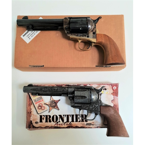 175 - FRONTEIR REPLICA COLT REVOLVER
with a decorative 12cm barrel and wood grip, boxed, together with a s... 