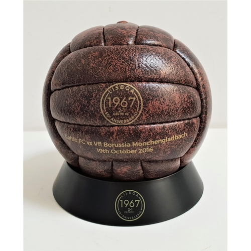 239 - CELTIC FOOTBALL CLUB INTREST
a miniature leather replica football to commemorate the 50th anniversar... 