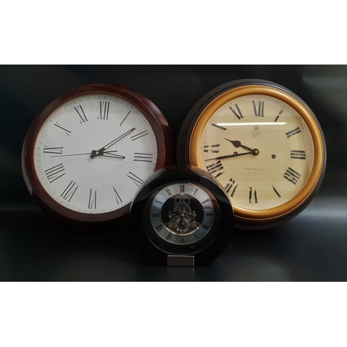 199 - NATICO INTERACTIVE GEAR TABLE CLOCK
the circular dial with Roman numerals and a quartz movement, 18.... 