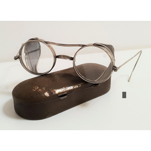 272 - PAIR OF VINTAGE SAFETY GLASSES
circa early 20th century with mesh side guards in a metal case 
Note:... 