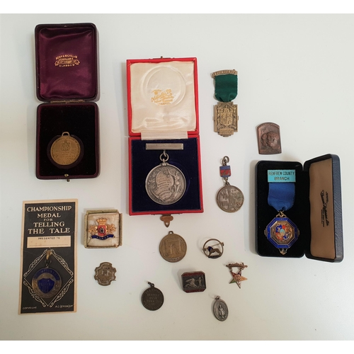 309 - SELECTION OF MEDALS AND BADGES
including a Georges Leygues Naval insignia badge, a 'Glory to our lib... 