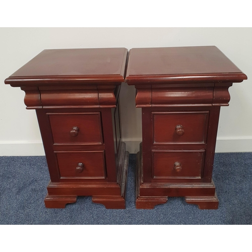 419 - PAIR OF TEAK BEDSIDE TABLES
with moulded tops above a frieze drawer and two panelled drawers, 66cm h... 