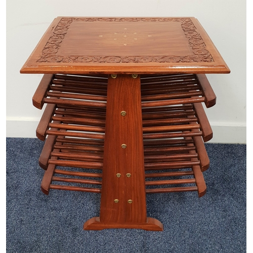 423 - TEAK MAGAZINE RACK
the square carved moulded top with brass inlay above eight slatted shelves, 56cm ... 