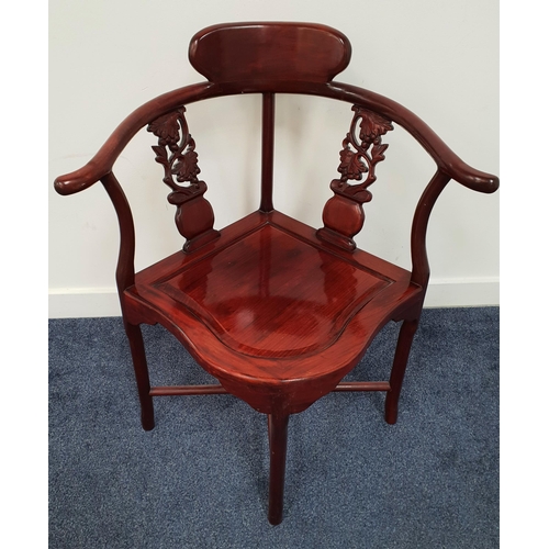 428 - STAINED HARDWOOD CHINESE CHAIR
with a shaped back and arms with two carved splats above a shaped pan... 