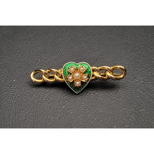 70 - ENAMEL AND SEED PEARL SET GOLD BROOCH
the green enamel heart decorated with seed pearl set flower an... 