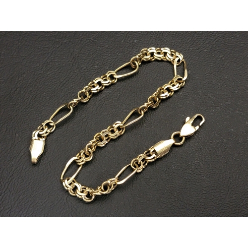 107 - FOURTEEN CARAT GOLD FIGARO LINK BRACELET 
approximately 10 grams and 22cm long