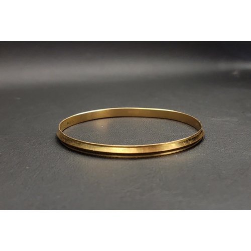 111 - TWENTY-TWO CARAT GOLD BANGLE 
approximately 19.5 grams