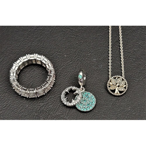 SELECTION OF FASHION JEWELLERY
comprising a Swarovski Vittore ring, a Pandora Sparkling Family Tree necklace and a Pandora Lucky Four Leaf Clover dangle charm