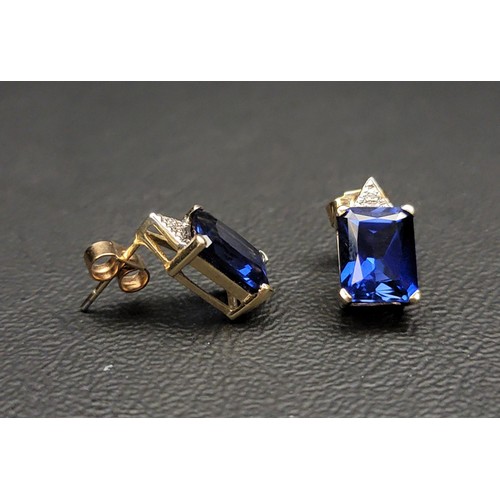 99 - PAIR OF SAPPHIRE AND DIAMOND EARRINGS
each of the emerald cut sapphires with small diamonds above, i... 