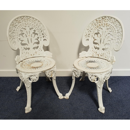 461 - PAIR OF COALBROOKDALE STYLE CAST IRON CHAIRS
painted white with pierced oval backs decorated with fe... 