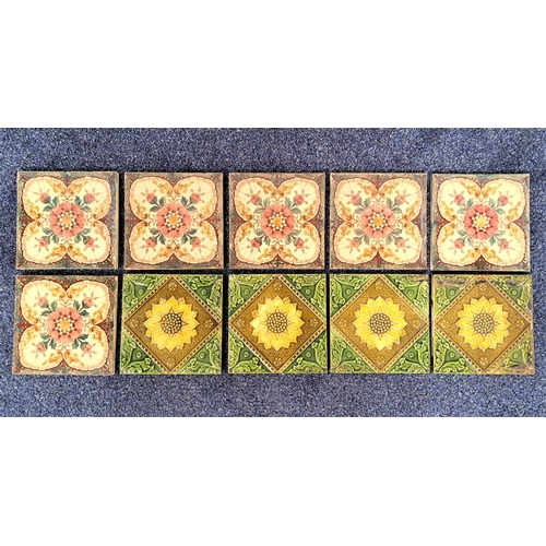 156 - TEN VICTORIAN FLOOR TILES
four decorated with sunflowers surrounded by leaves, and six decorated wit... 