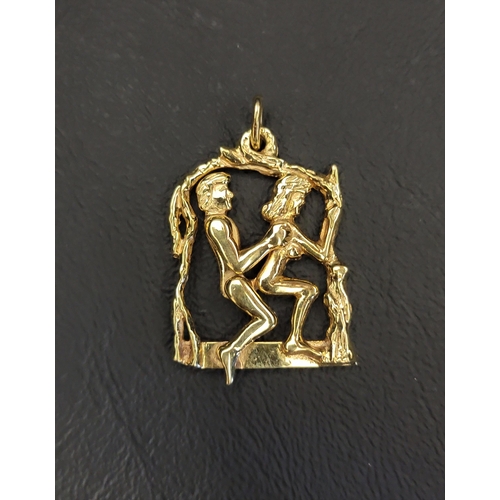 81 - UNUSUAL EROTIC NINE CARAT GOLD PENDANT
the male figure with articulated body seated behind the femal... 