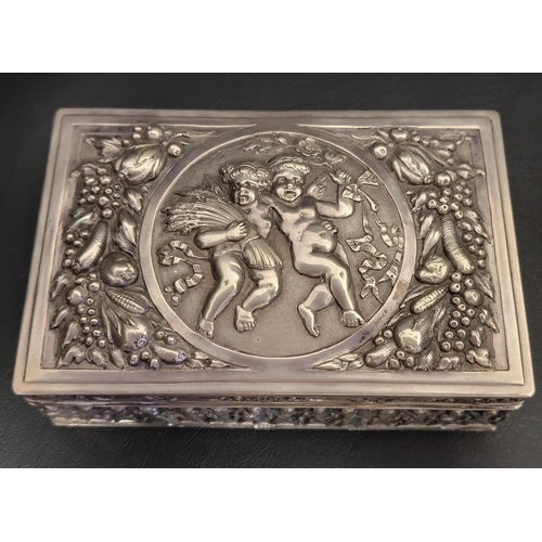 132 - EMBOSSED SILVER TRINKET BOX
with profuse embossed decoration overall, the cover with central roundel... 