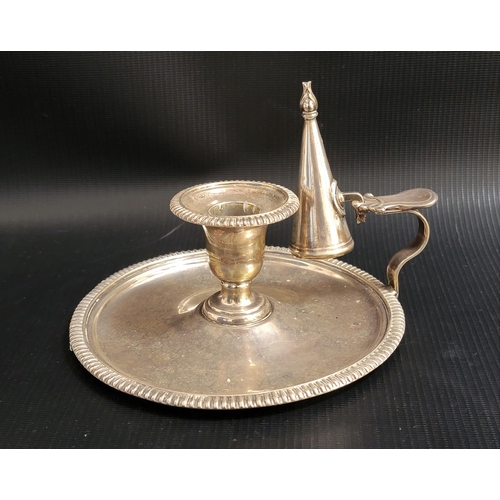 137 - VICTORIAN SILVER CHAMBERSTICK
the circular base and removable sconce with gadrooned rims, with conic... 