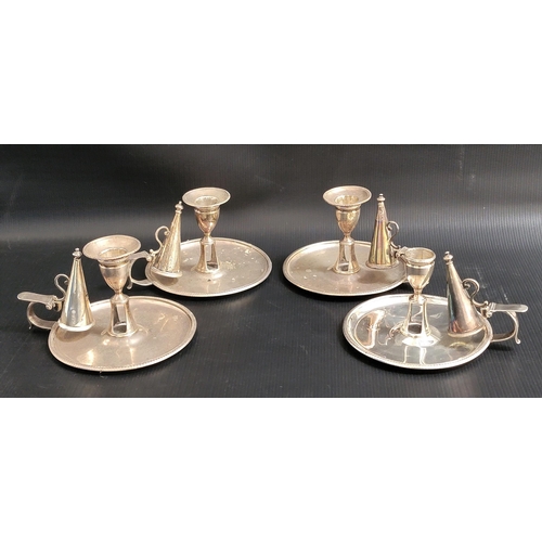 138 - SET OF FOUR GEORGE III SILVER CHAMBERSTICKS
the circular bases and removable sconces (one lacking) w...