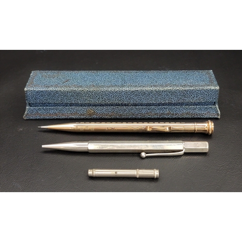 140 - TWO PROPELLING PENCILS
one in silver, London hallmarks for 1947; and the other a gold plated Wahl Ev... 