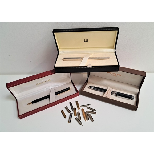 224 - THREE BOXED PENS
comprising a Dunhill silver plated fountain pen with fourteen carat gold nib; a Jos... 