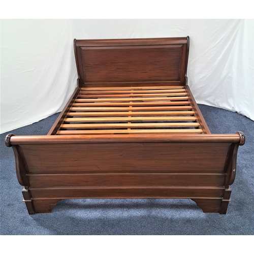 487 - SLEIGH BED
with a shaped head and foot board, with side supports and slatted base struts, 161cm wide