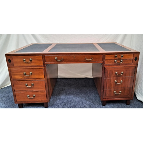 421 - TEAK DESK
with a three section inset synthetic leather top above an arrangement of drawers and a cup... 