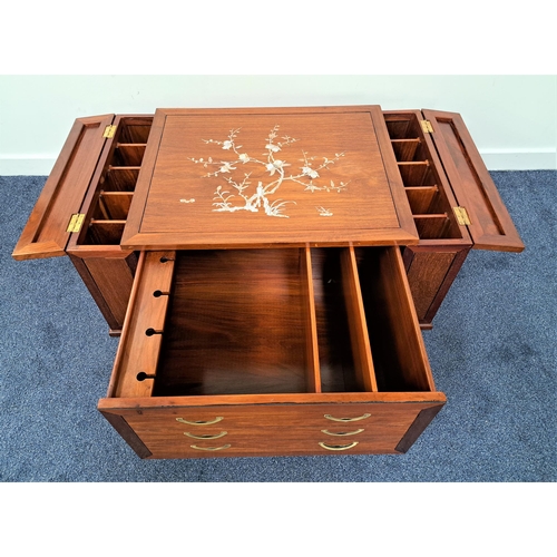 424 - TEAK LOW DRINKS CABINET
with an inlaid mother of pearl tree to the top flanked by two bottle compart... 