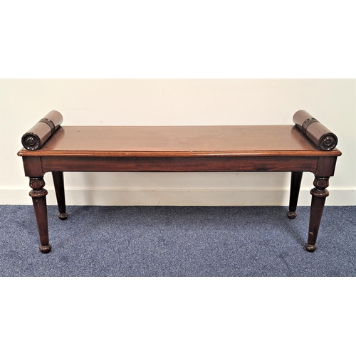 446 - GEORGE III STYLE MAHOGANY HALL BENCH
the rectangular moulded seat with cylindrical roll ends, standi... 