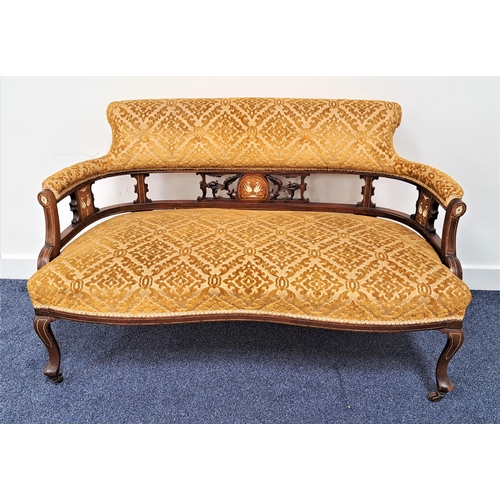 447 - EDWARDIAN MAHOGANY PARLOUR SOFA
with a shaped padded button back above carved columns inlaid with gr... 