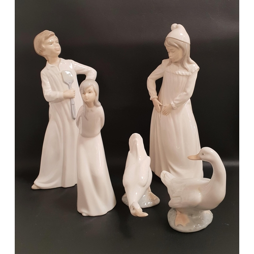 163 - FOUR NAO FIGURINES
comprising boy with a fly swatter, 29cm high, girl with a torn nightgown, 29cm hi... 