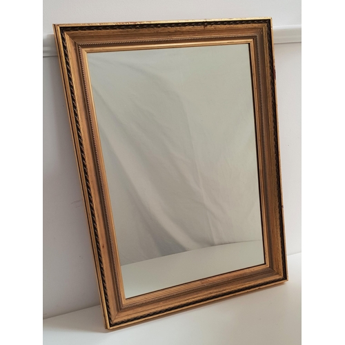 397 - RECTANGULAR WALL MIRROR
with a plain plate and a giltwood frame, 71cm x 52cm